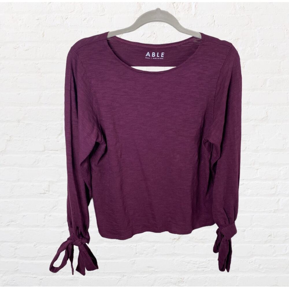 Able purple longs sleeve top with bow tie wrists